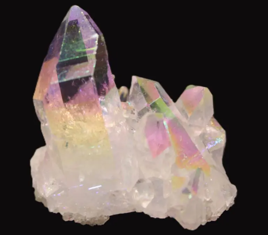 A colorful, iridescent crystal cluster with sharp geometric formations.