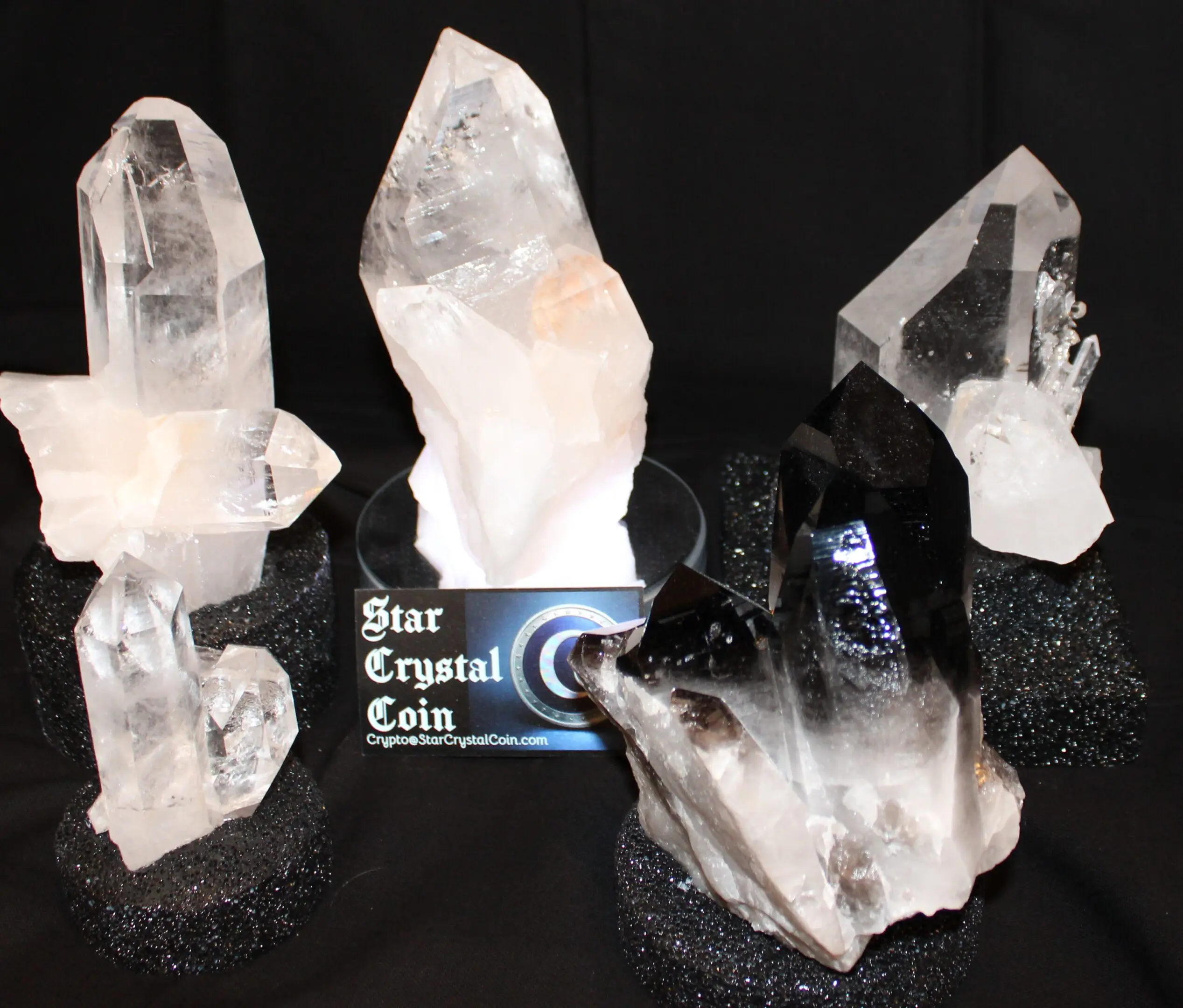 Clear quartz and smoky quartz crystal display.