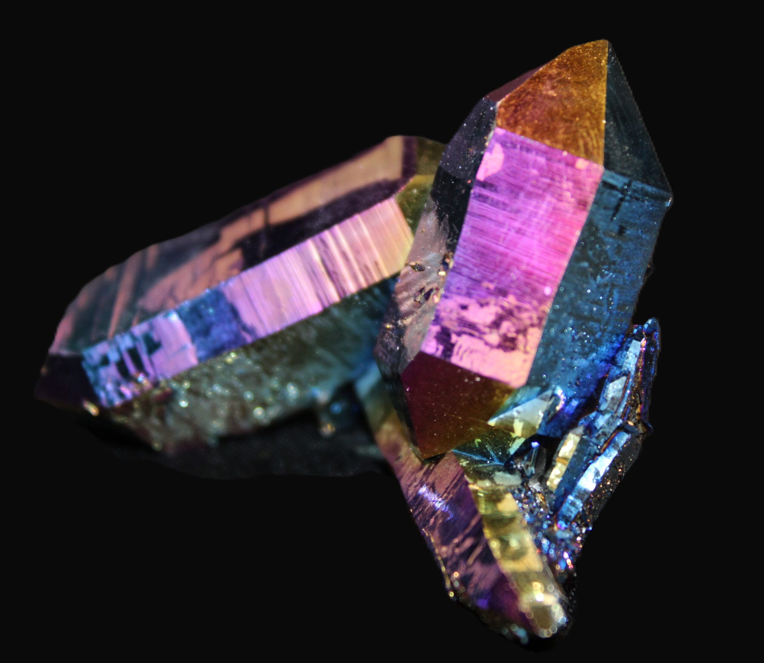 A close up of a crystal on black background