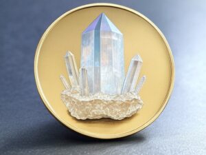 A plate with a crystal on top of it